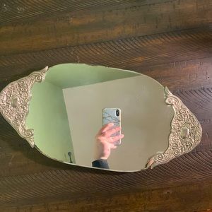 Godinger Silver Co., silver oval mirror tray.